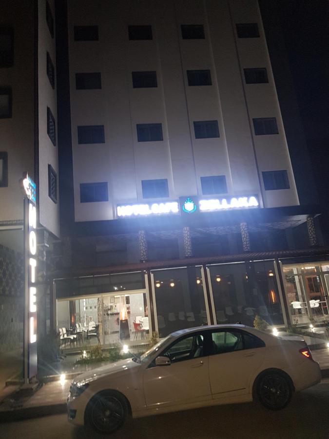 Zellaka Hotel & Cafe Хурибга Экстерьер фото